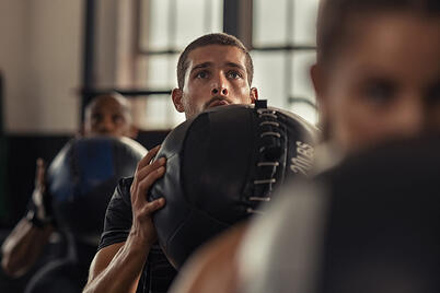 Man Exercising with Medicine Ball