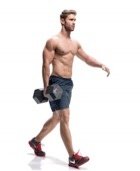 man doing farmer's walk