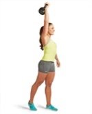 woman lifting kettlebell