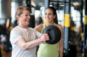 senior lady with medicine ball