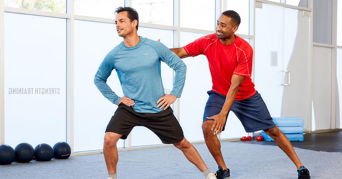 client doing corrective exercise stretches