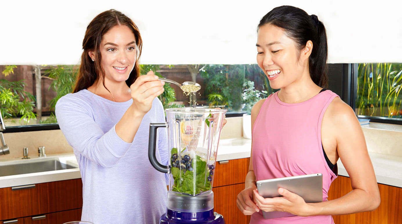 Women making a smoothie