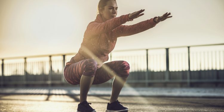 woman doing a squat
